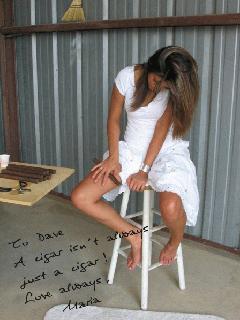 Kimberly Casarez posed for Sweaty Thighs Cigars as 'Maria the Cuban Virgin', rolling cigars by hand Kimberly Casarez 1.jpg